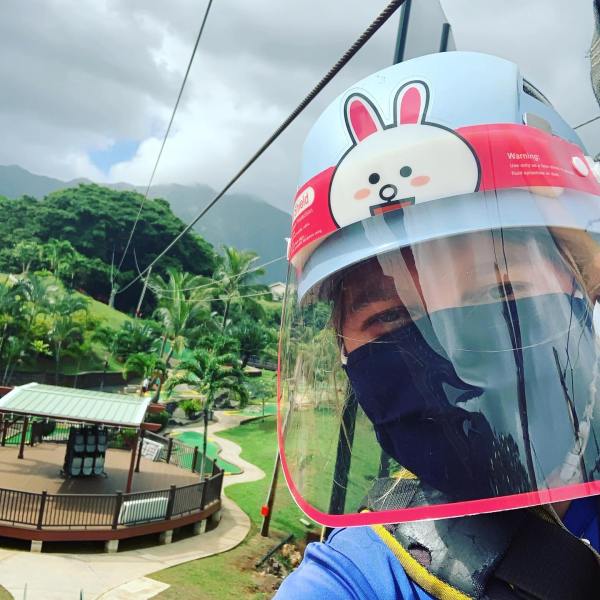 a person holding a kite