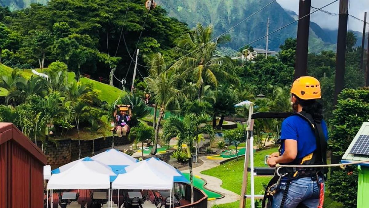 a group of people standing on top of Genting Highlands