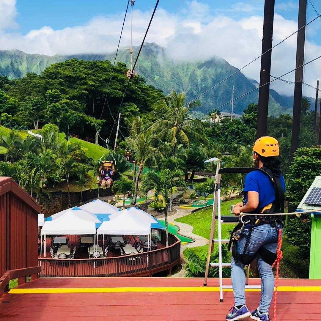 a group of people standing on top of Genting Highlands