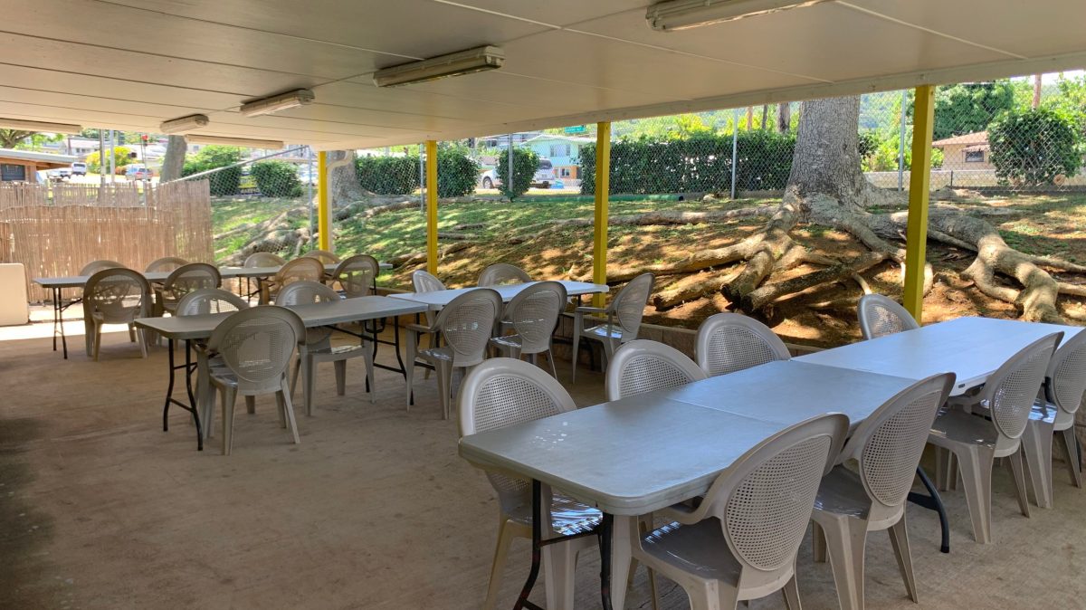 a dining room table in front of a building